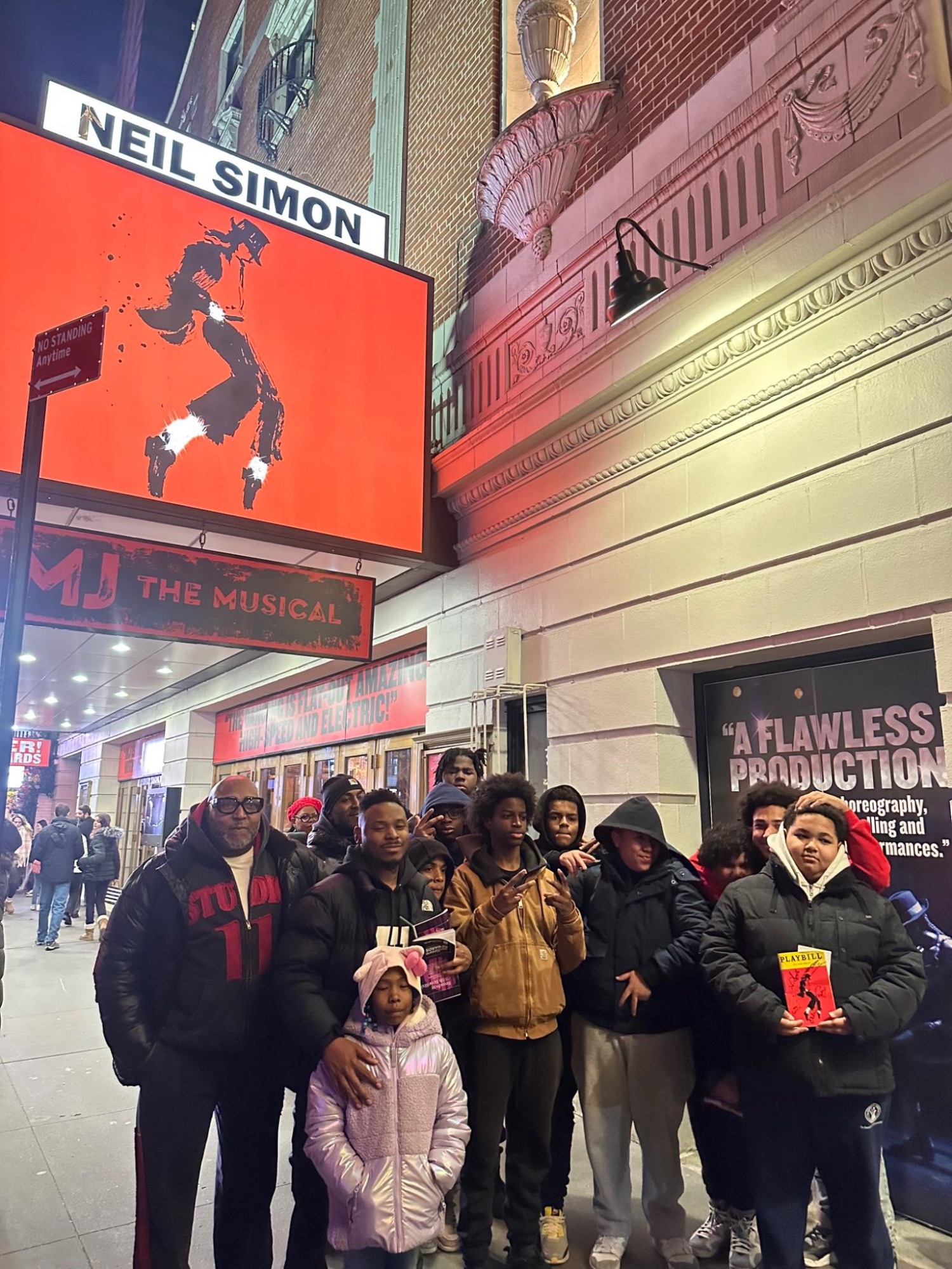 Scholars in Times Square before a Broadway show