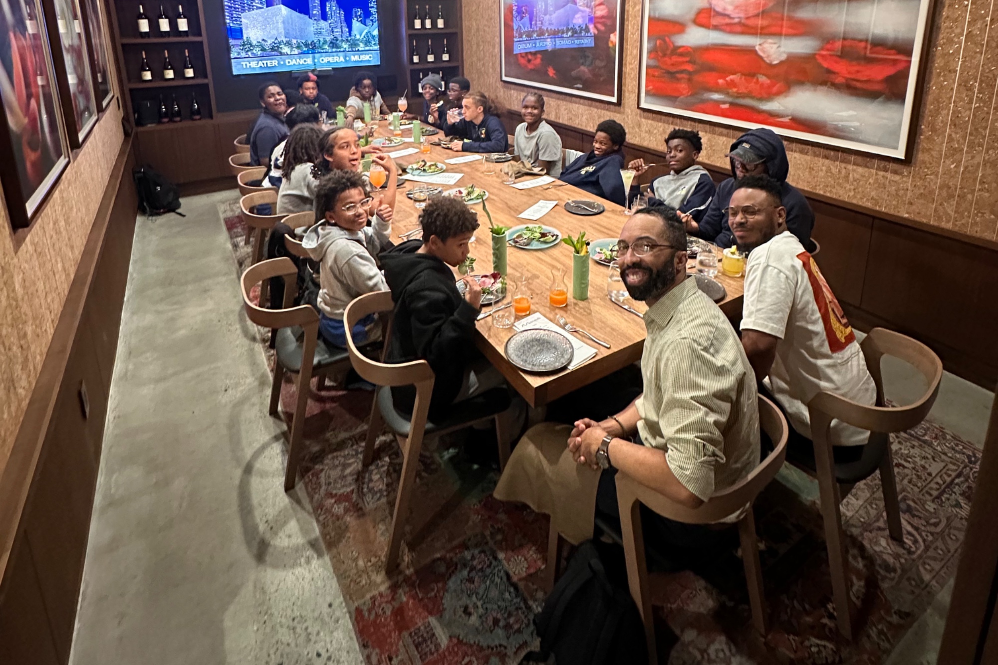 Scholars and mentors at a private dinner before a night of theater