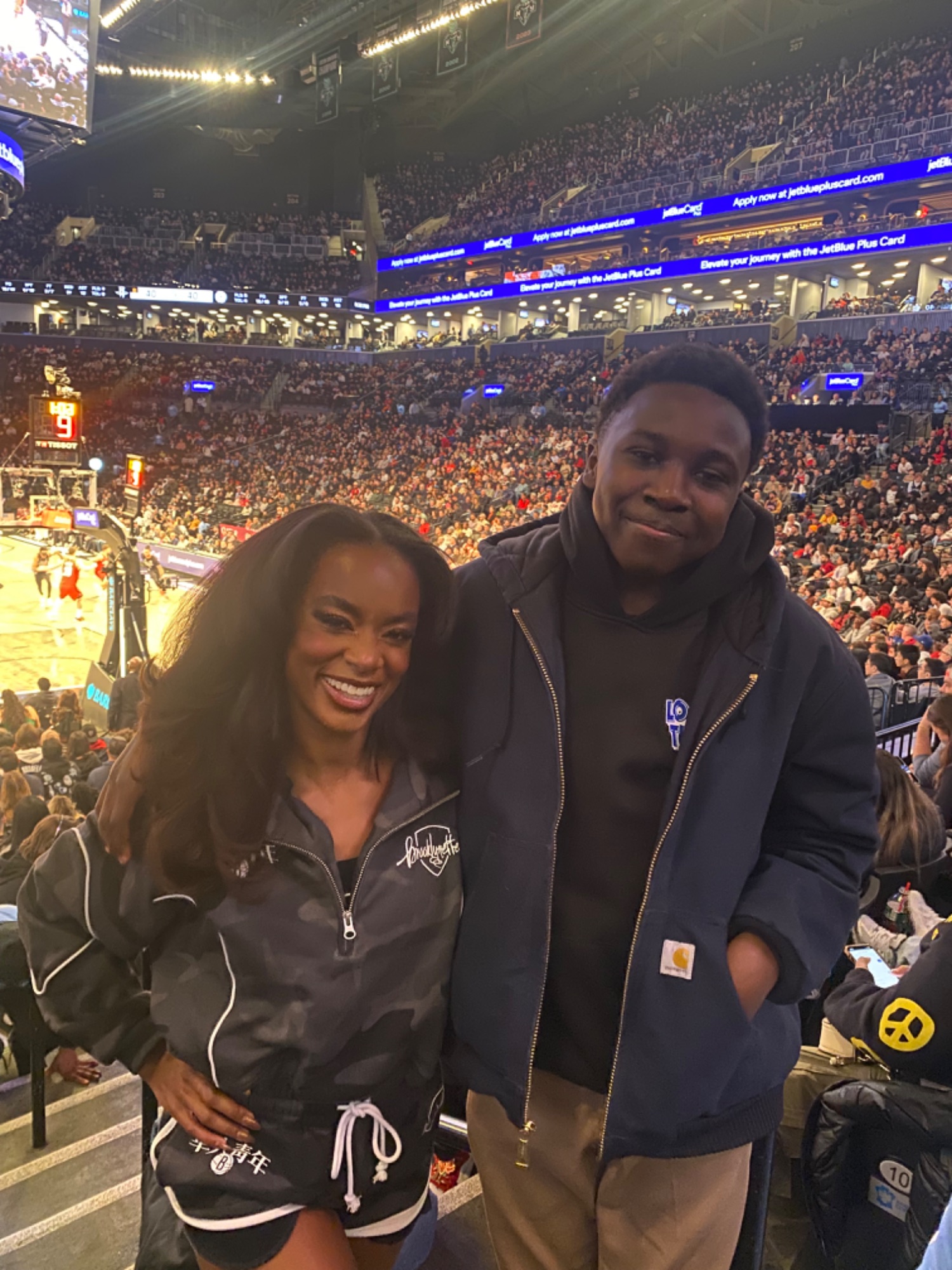 A scholar courtside at a Brooklyn Nets game