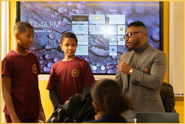 Ace Clark leading a workshop with scholars