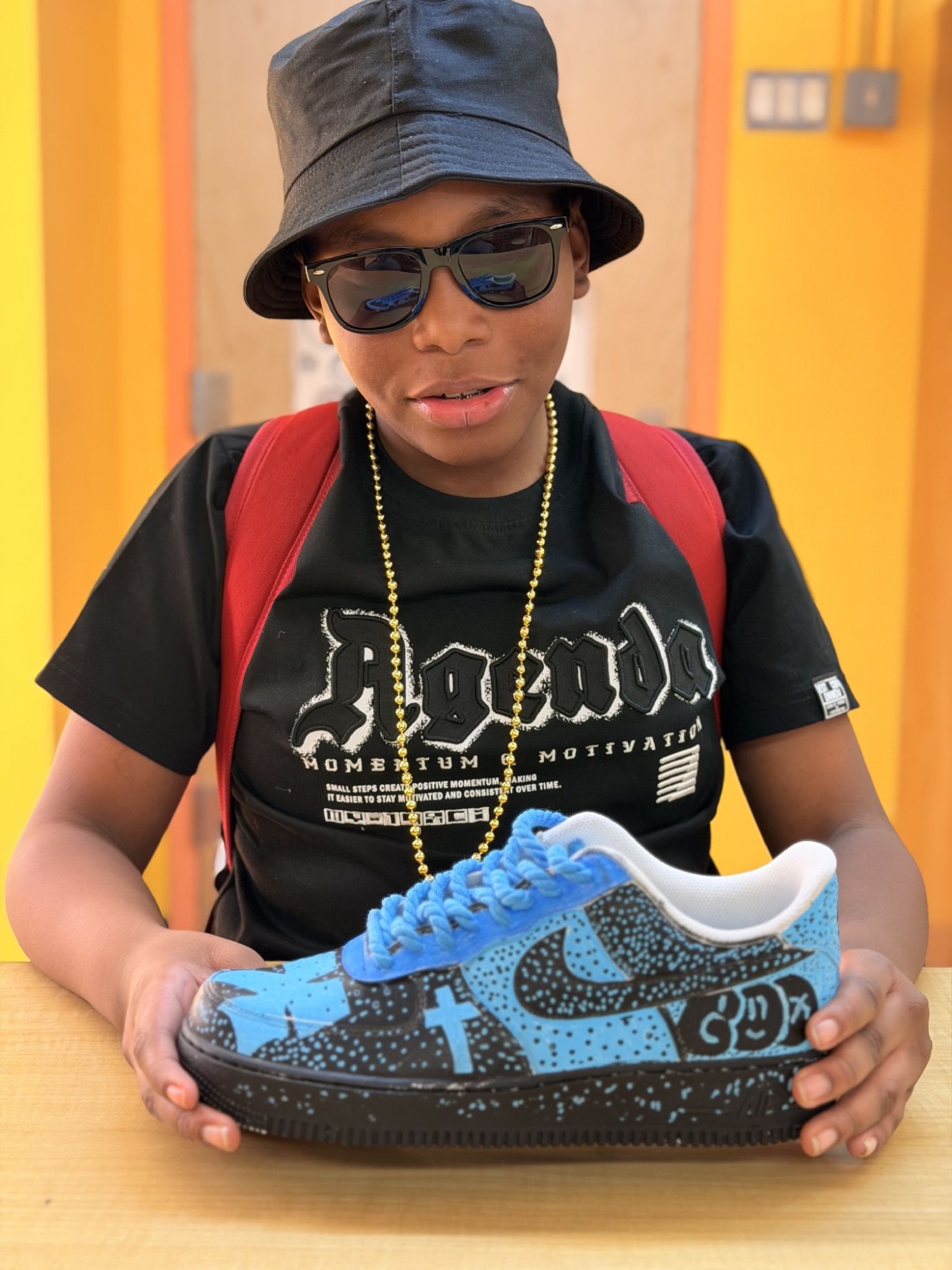 Scholar with a custom sneaker