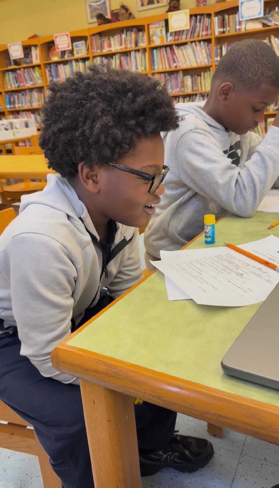 Scholars reading and writing together